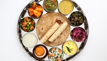 Budget Meal: A delicious meal package with sabji, daal, rice, chapati, and raita